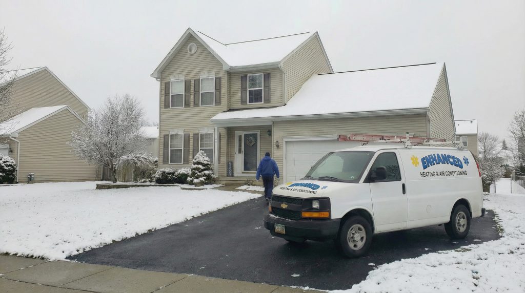Local furnace repair service van arriving at Delaware home